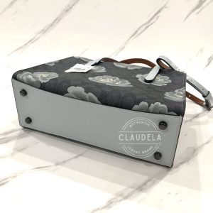 COACH Charlie Carryall 28 in Signature Rose Print
