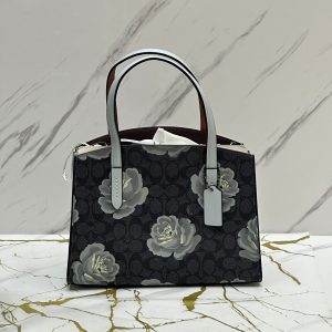 COACH Charlie Carryall 28 in Signature Rose Print