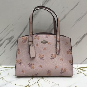 COACH Charlie Carryall 27 with Floral Bow Print in Ice Pink
