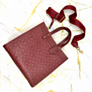 Coach  Field Tote 30 Medium in Wine Embossed Signature Leather