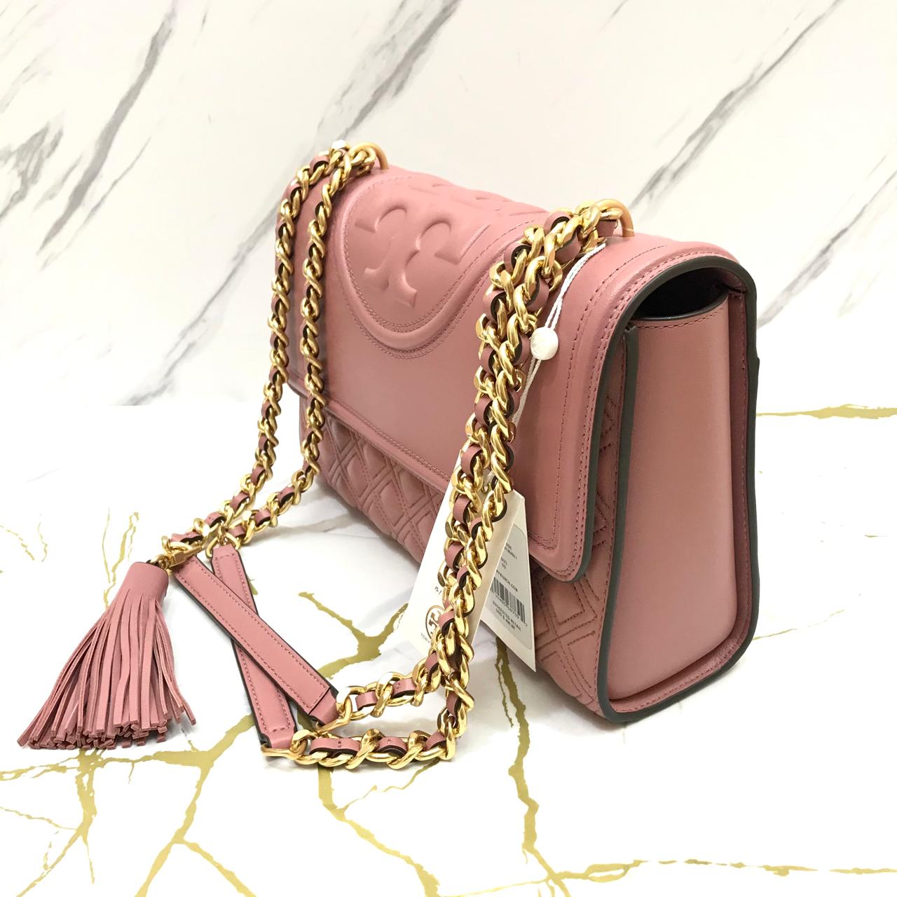 tory_burch_fleming_medium_shoulder_bag_in_pink_magnolia_1.jpeg